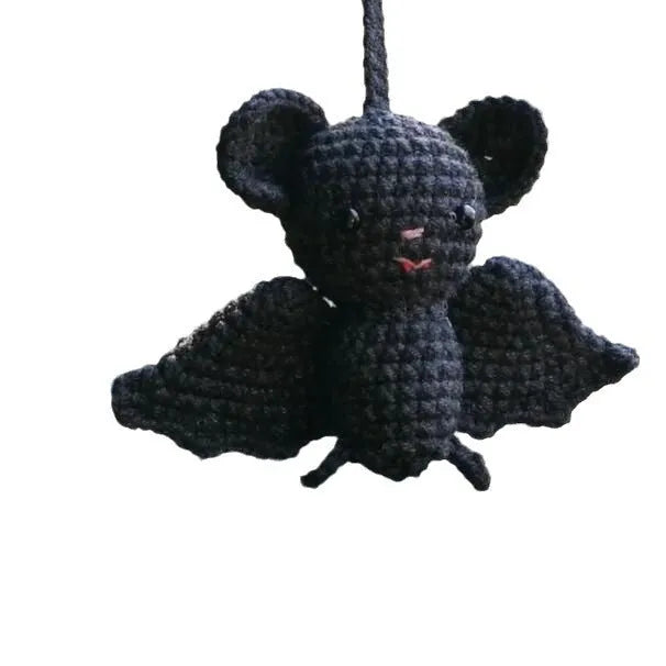 Plush hand-woven polyester automobile hanging ornament with cartoon style design on car dashboard