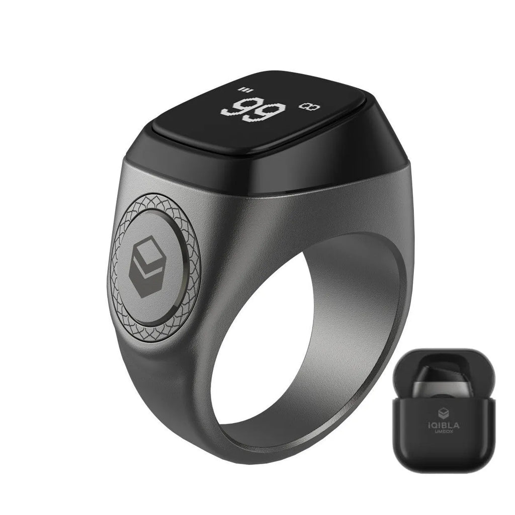 Zikr1 metal smart ring with OLED screen on a finger, showing a Tasbih count.