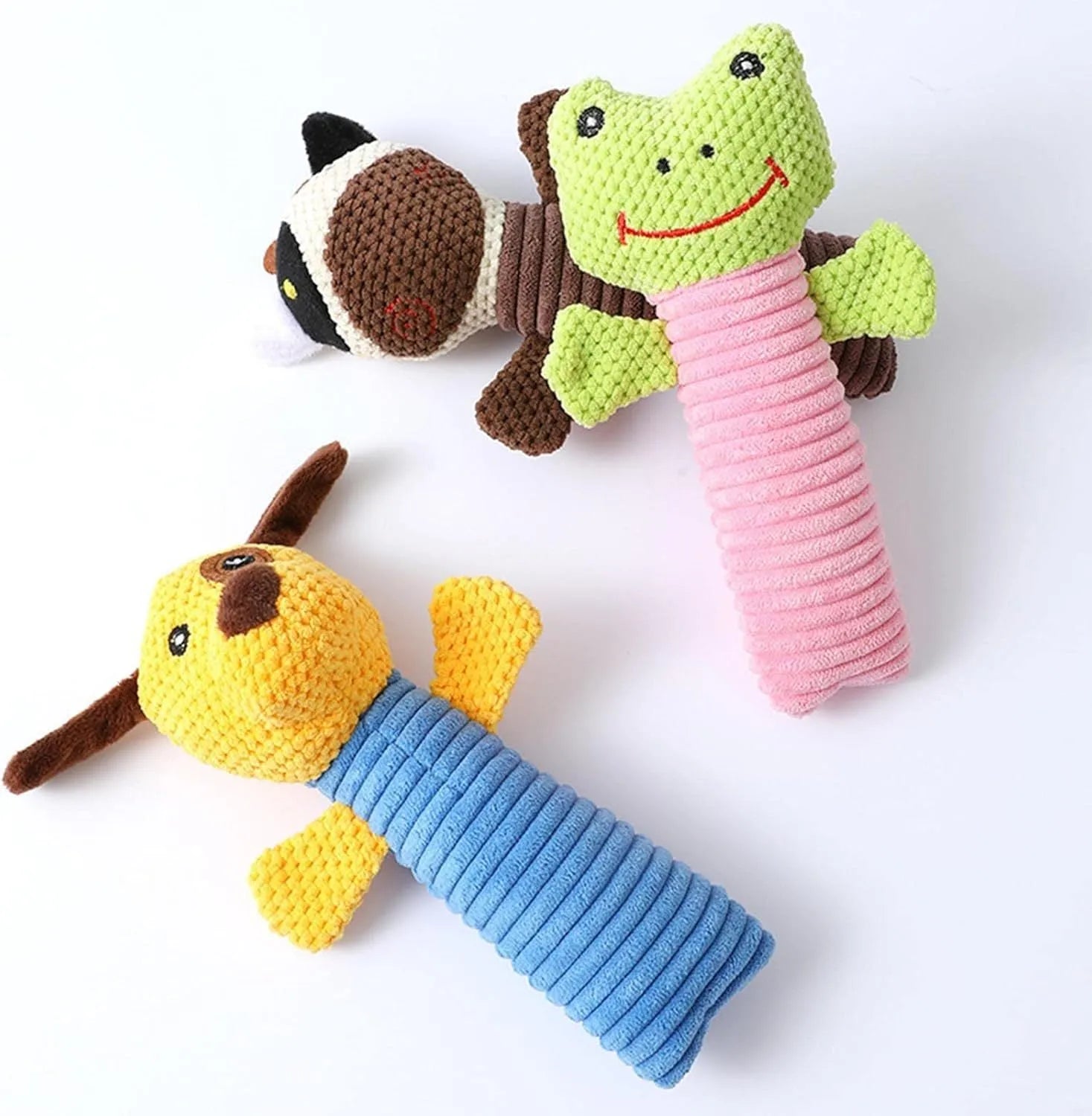 Three dog squeaky chew toys showing calf, frog, and puppy shapes, 19cm long soft plush construction