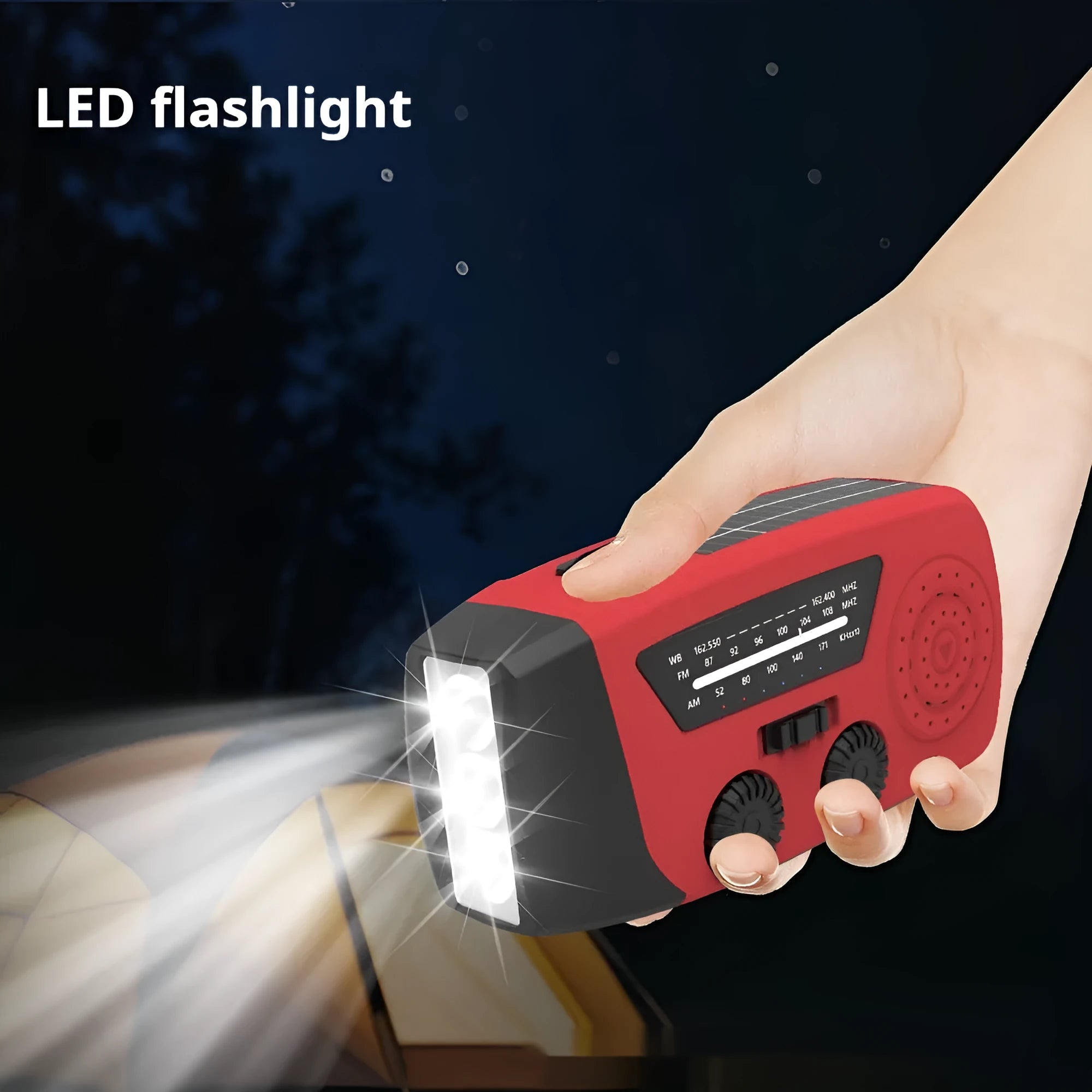 Red rechargeable emergency radio torch with AM/FM receiver, LED flashlight, and wrist strap