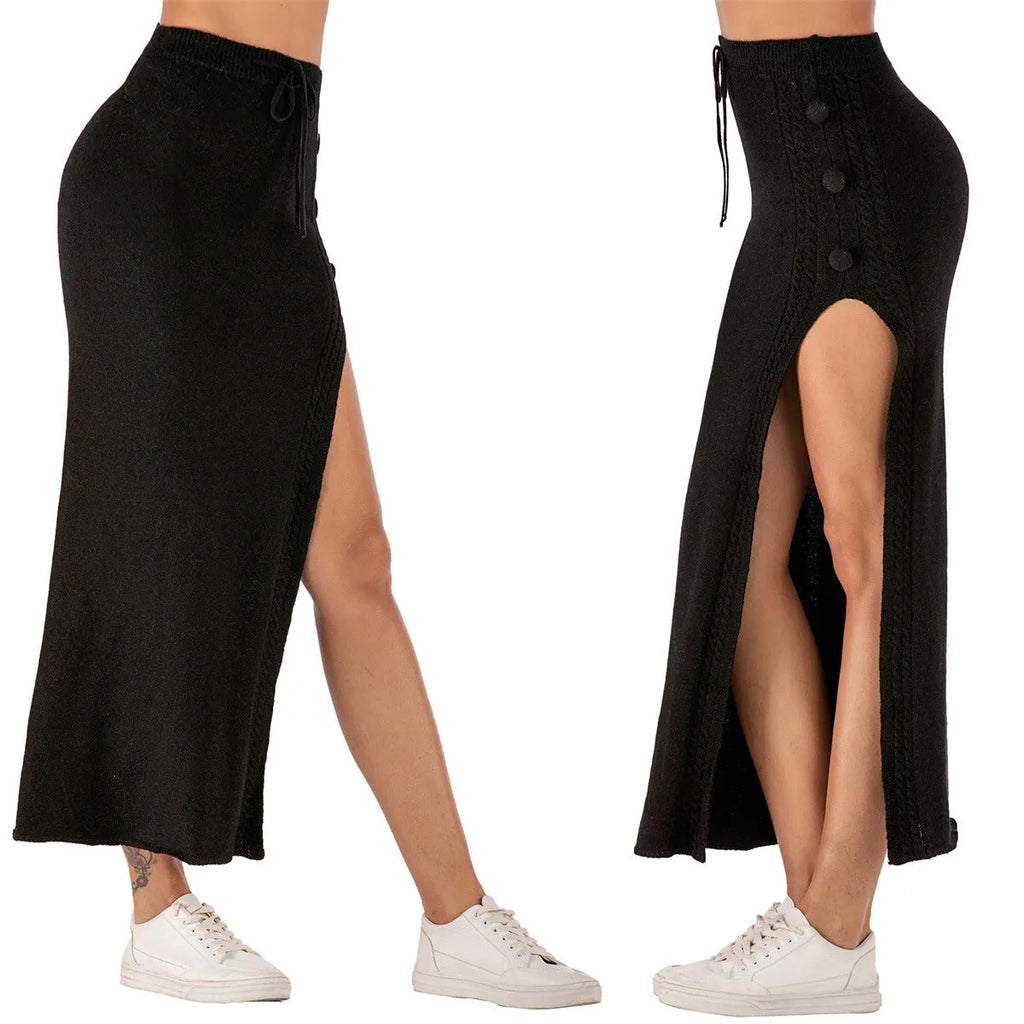 Women's black slim-fit acrylic midi skirt with a side split detail on a mannequin.