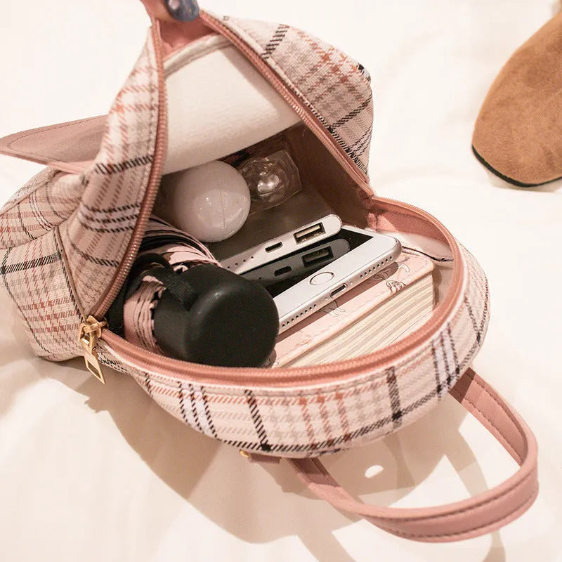 One shoulder diagonal phone bag in PU material, shown in a choice of black, blue, brown, pink, or red.