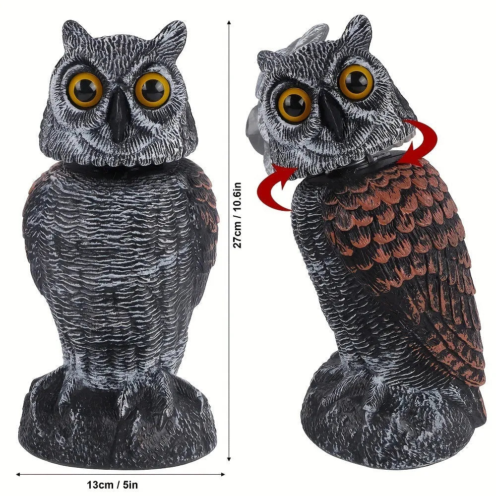 Artificial owl bird scarer decoy with shaking head motion in outdoor setting