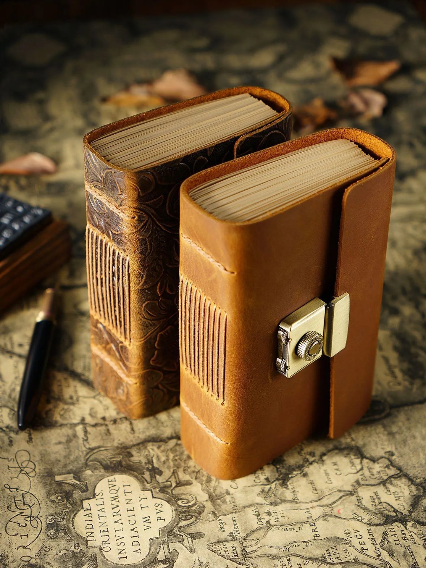 Vintage cowhide leather journal open on blank brown paper pages, A5 size, Crazy Horse brown colour with distressed finish