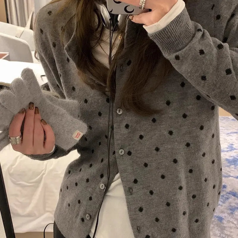 Women's gray dot pattern knitted cardigan with long sleeves and crocheted flower details