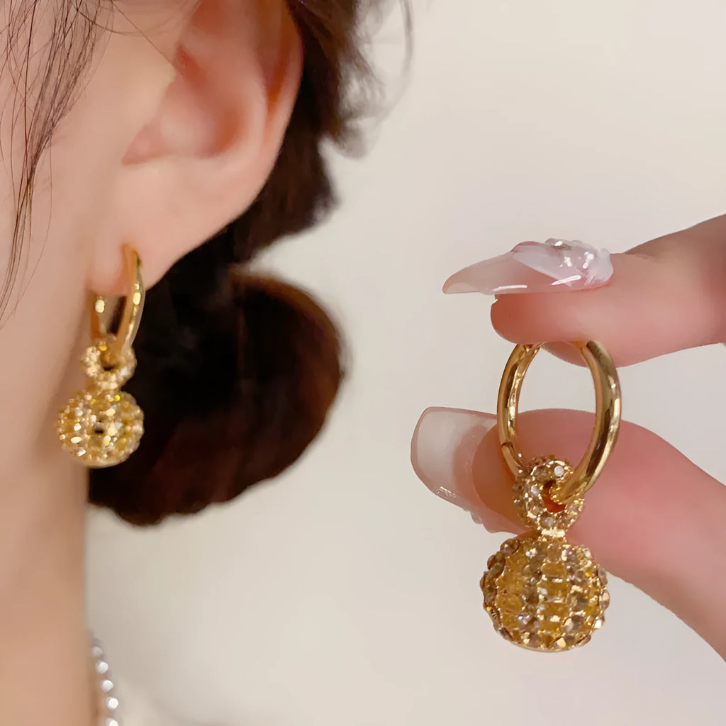 Coffee colour full diamond hollow ball ear clip with thick real gold plating on copper for women, geometric round shape.