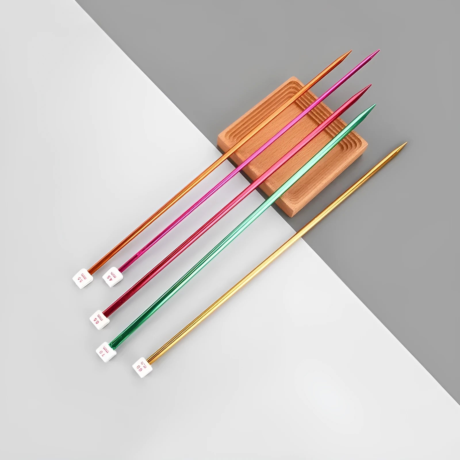 Lengthened crochet hook set with protective caps showing 14 different sizes from 2.0mm to 10.0mm