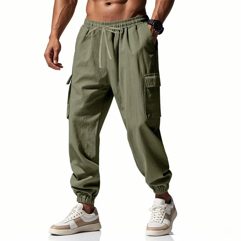 Men's loose-fit linen trousers in Army Green with ankle-tied cuffs and multiple pockets.