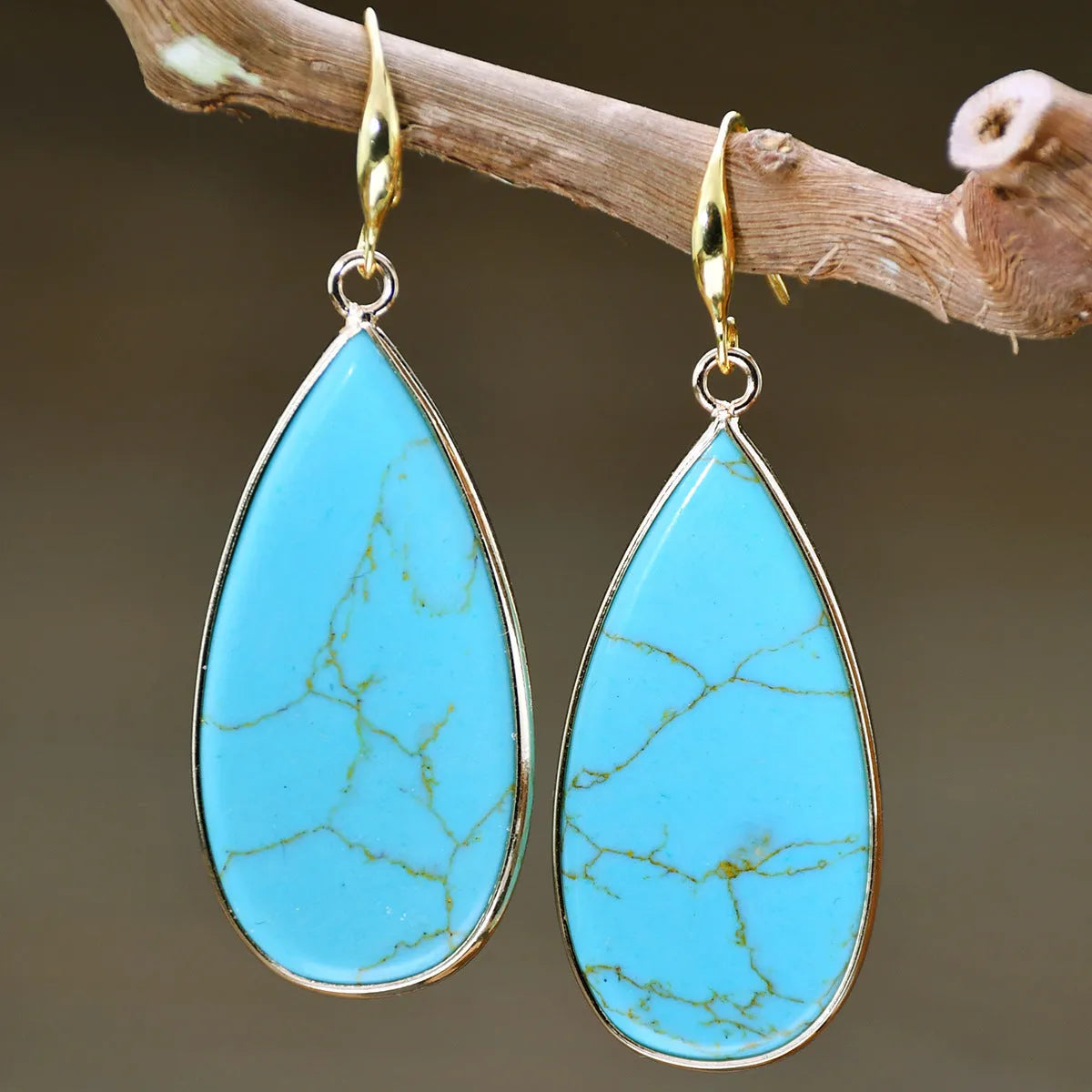 Vintage Tigereye stone drop earrings with handcrafted texture details and water drop pendant shape