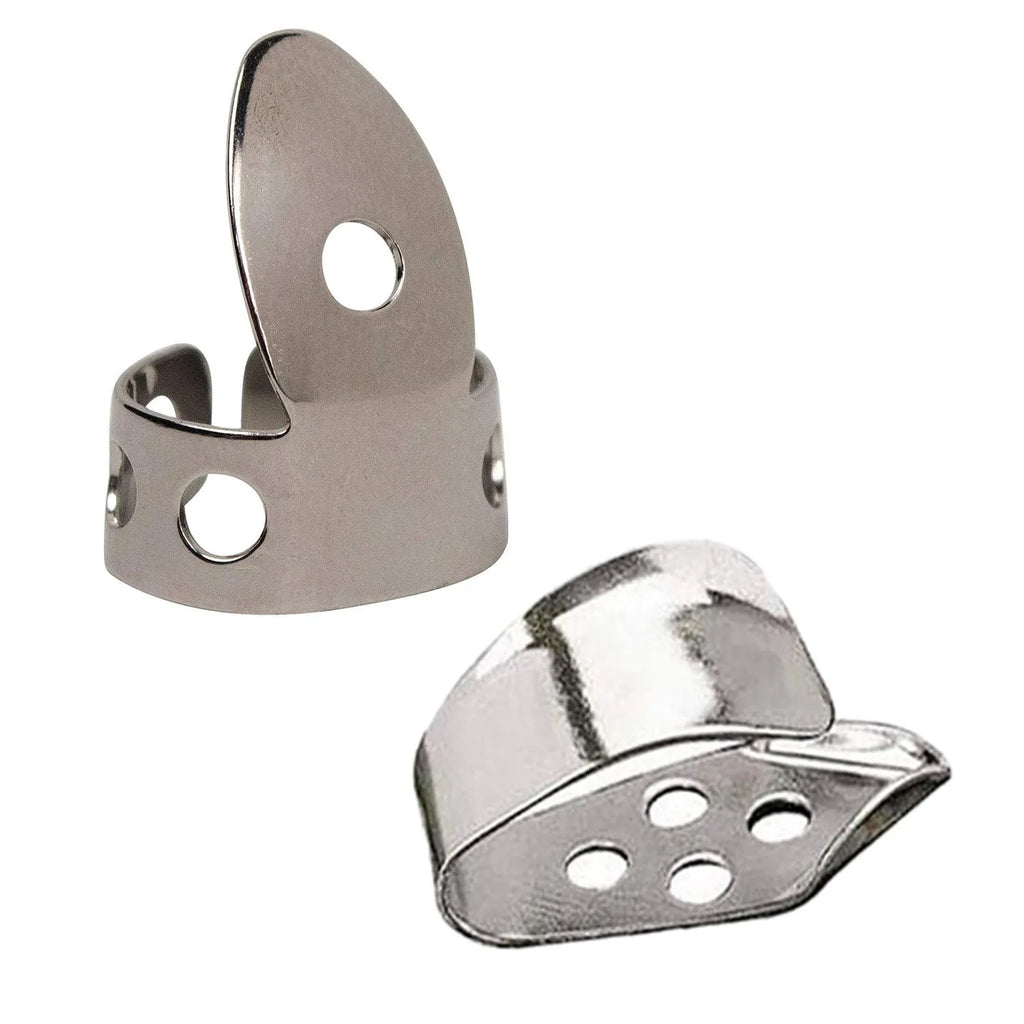 Set of 4 metal guitar finger picks arranged on a dark surface