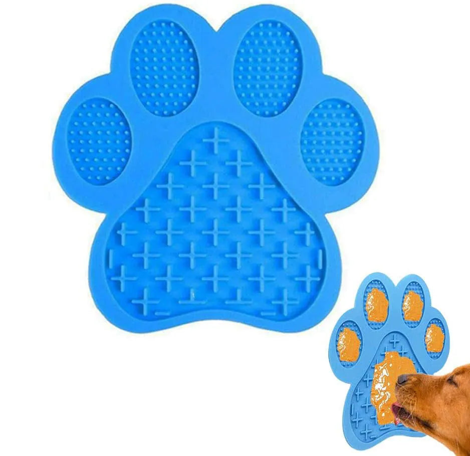 Blue silicone dog licking mat with bone texture and suction cups on back for bath time and slow feeding.