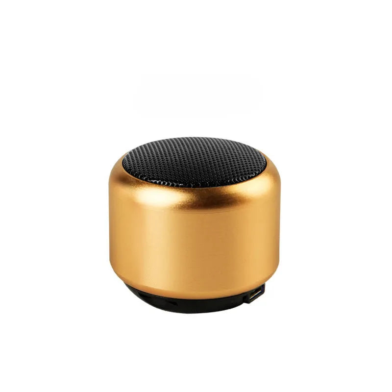 Small portable wireless Bluetooth speaker shown in black, blue, gold, and pink colour options.