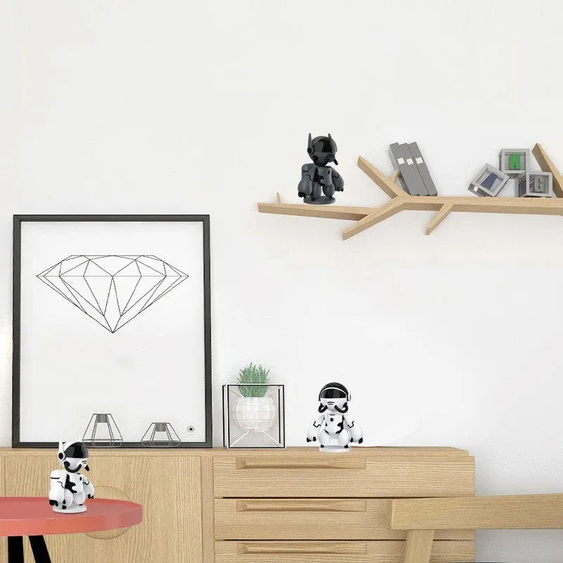 White or black Space Robot home monitoring camera on a detachable base with anti-slip pads.