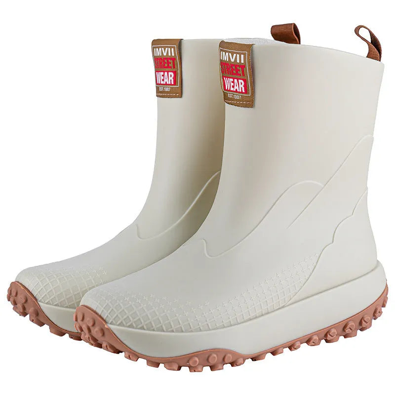 Men's mid tube PVC rain boots in black with non-slip plastic sole, round toe, flat heel