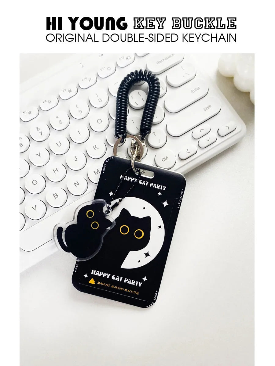 Plastic card holder with cartoon black cat design and a metal ferrule pendant attached.