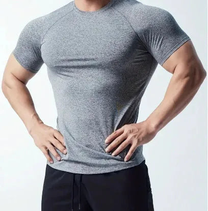 Men's casual short sleeve round neck t-shirt in black, grey, green, or pink, made from quick-dry polyester fabric.