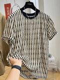 Black striped men's pullover shirt with loose fit and short sleeves made from linen silk blend fabric