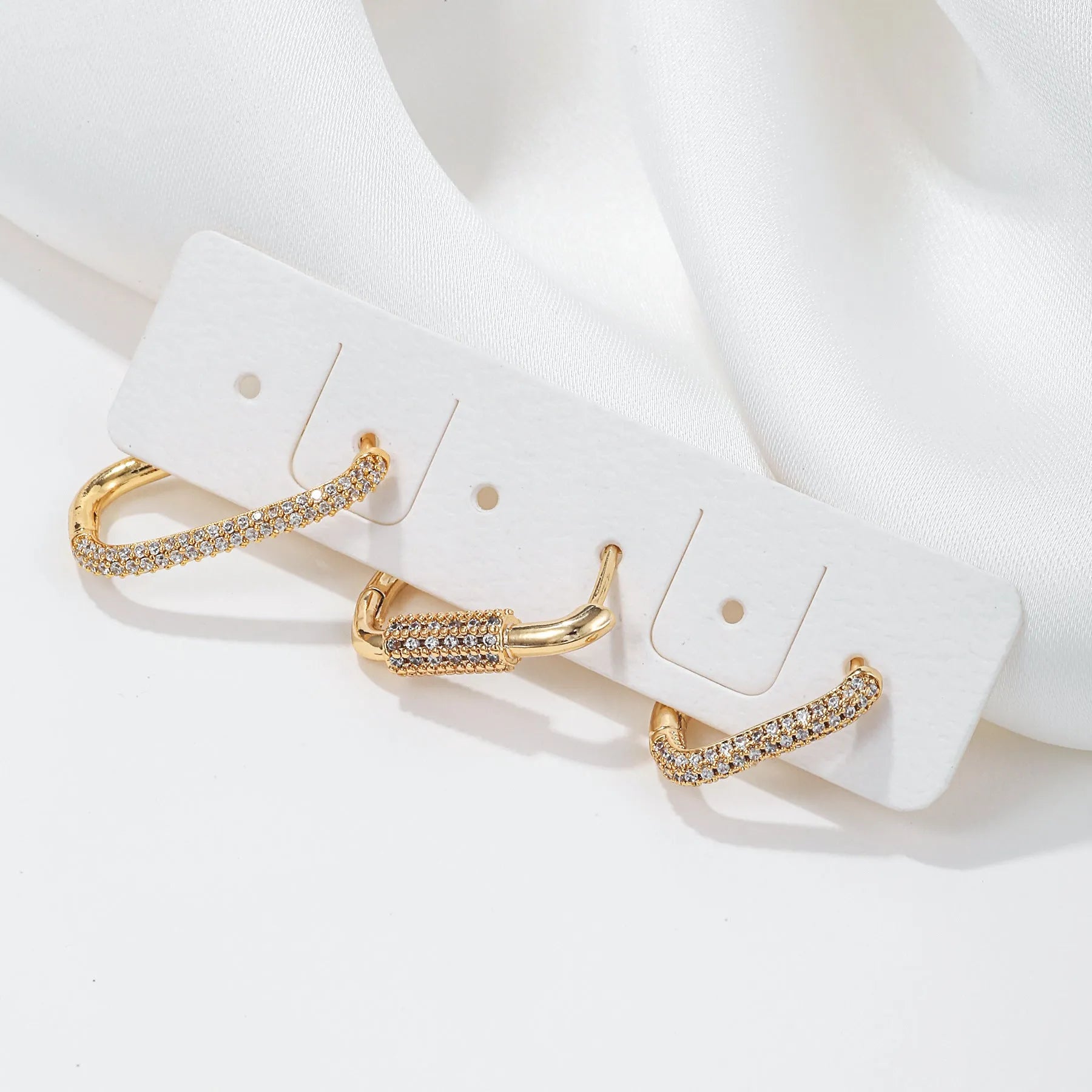 Geometric copper ear clip three-piece set with micro inlaid zircon details in gold or white k colours