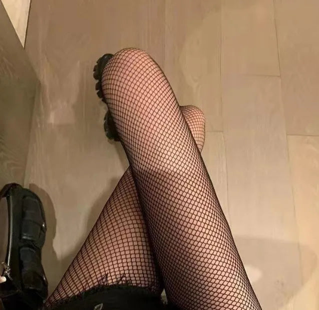 Women's summer mesh stockings showing large, medium and small net patterns in black and white colours