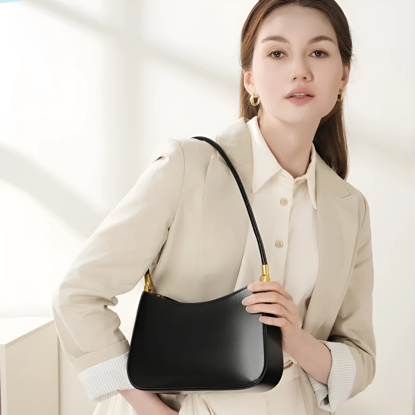 Women's casual French-style oval one-shoulder bag in cowhide leather, 25.5x6x14cm, available in black