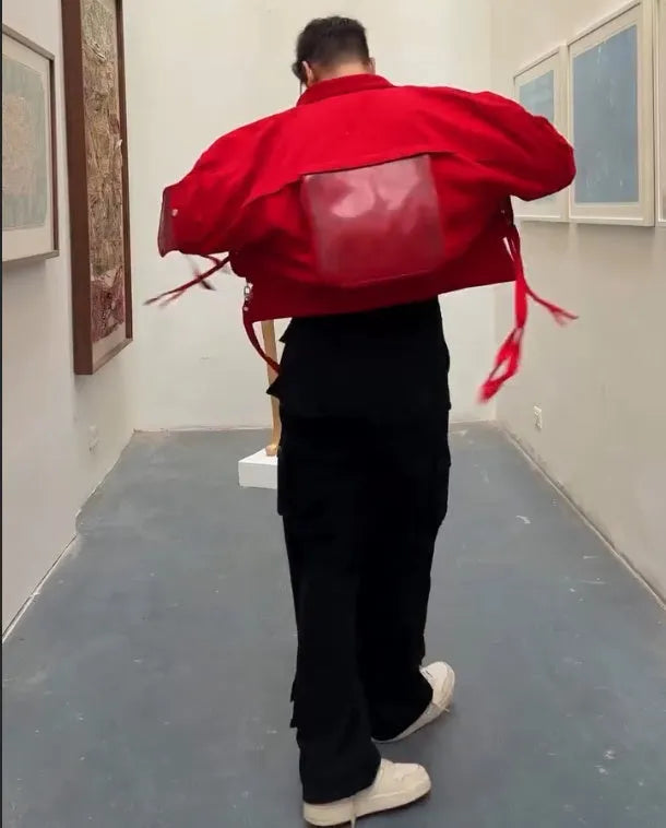Men's red short jacket on display showing front view and cropped cut