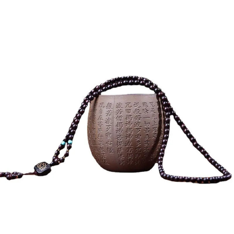 Zambian rosewood Buddha beads bracelet with flat lotus pendant showing 108 wooden beads