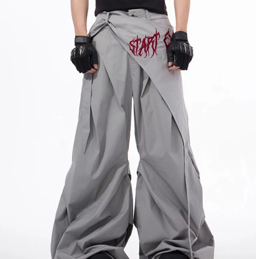 Boy's wide-leg summer pants in Korean style, shown in black and grey colour options.