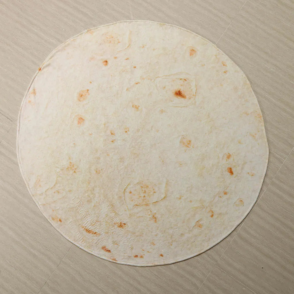 Round burrito design blanket in coral fleece flannel with tortilla print, folded to show size