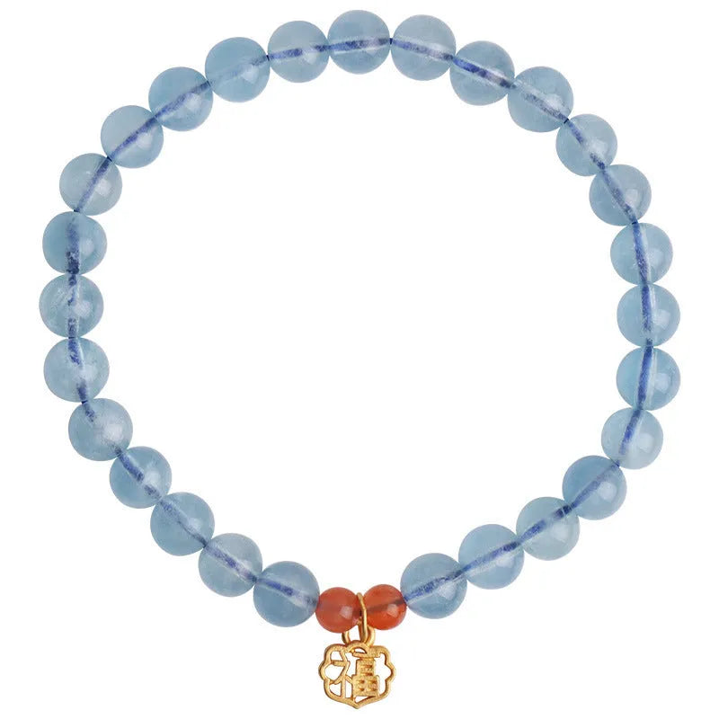 Icy translucent natural aquamarine crystal bracelet with 8mm round beads and a blessing card.