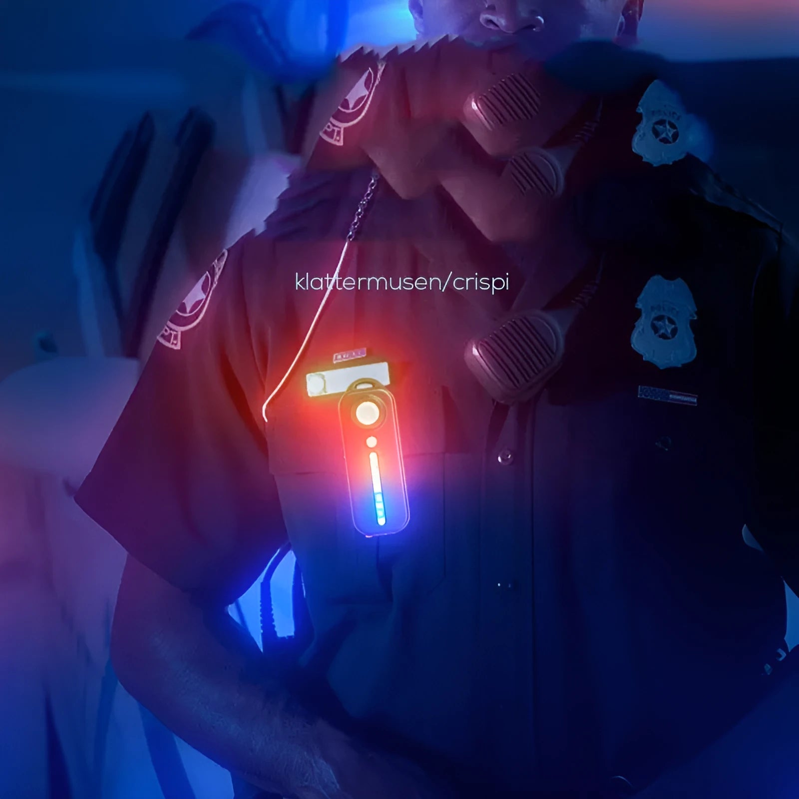 Black bicycle warning taillight with clip and strap on a backpack strap, showing red and blue flash mode