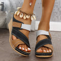 Women's wedge-heel slipper sandals with a Velcro strap, shown in a two-tone colour combination.