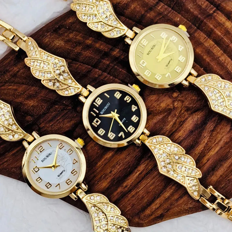 Women's stainless steel watch with round dial on wrist, showing Vachette clasp.