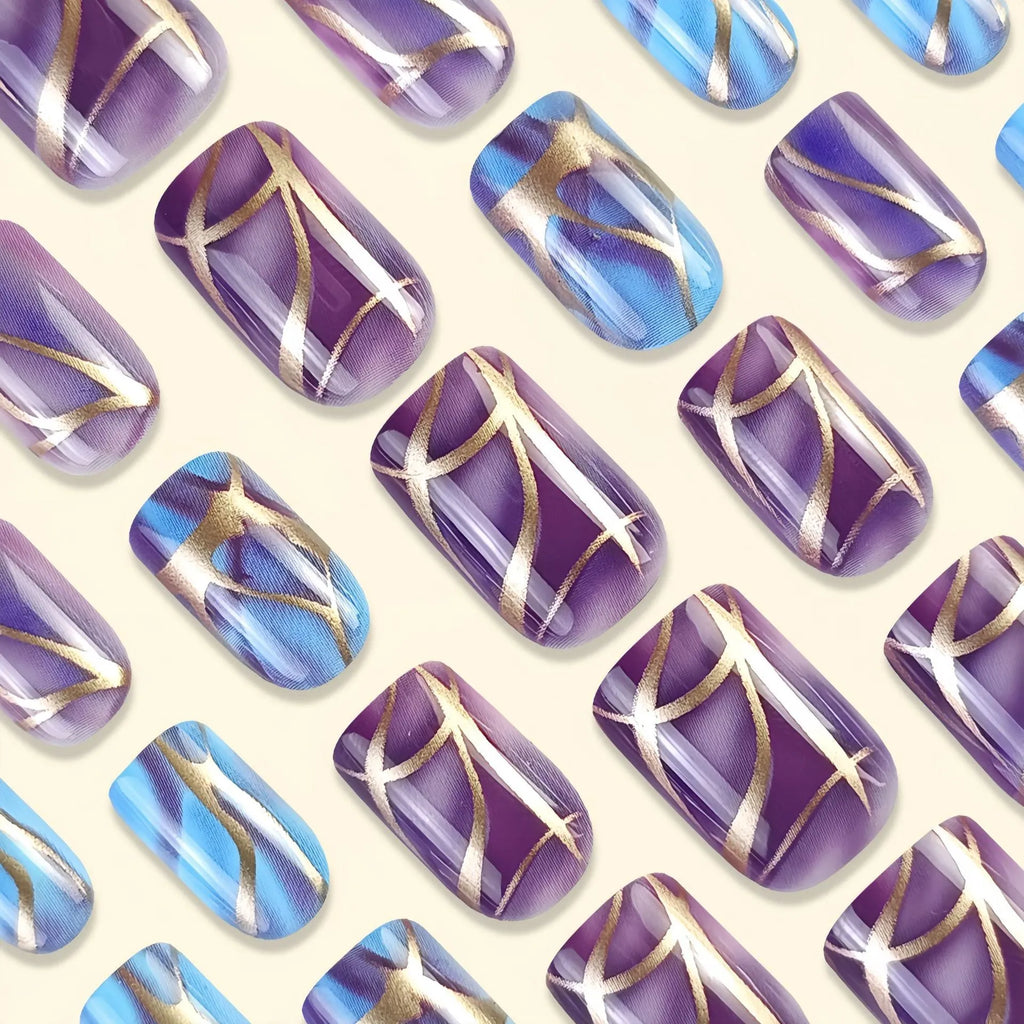 Mid-length purple and white striped nail art stickers on a nail.