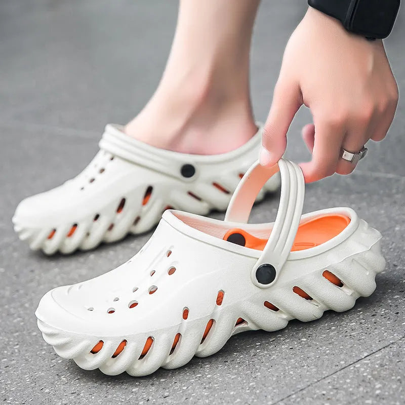 Men's beige EVA slipper sandals with hollow-out design and textured non-slip sole.