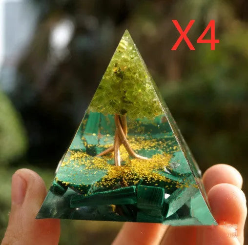 Clear epoxy resin pyramid ornament with embedded blue lapis lazuli crystal gravel, 6cm tall.
