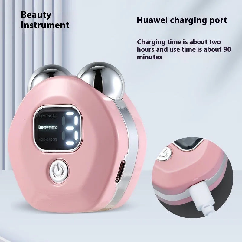 Portable white hot compress micro current facial massage instrument with double-roller head on a table.