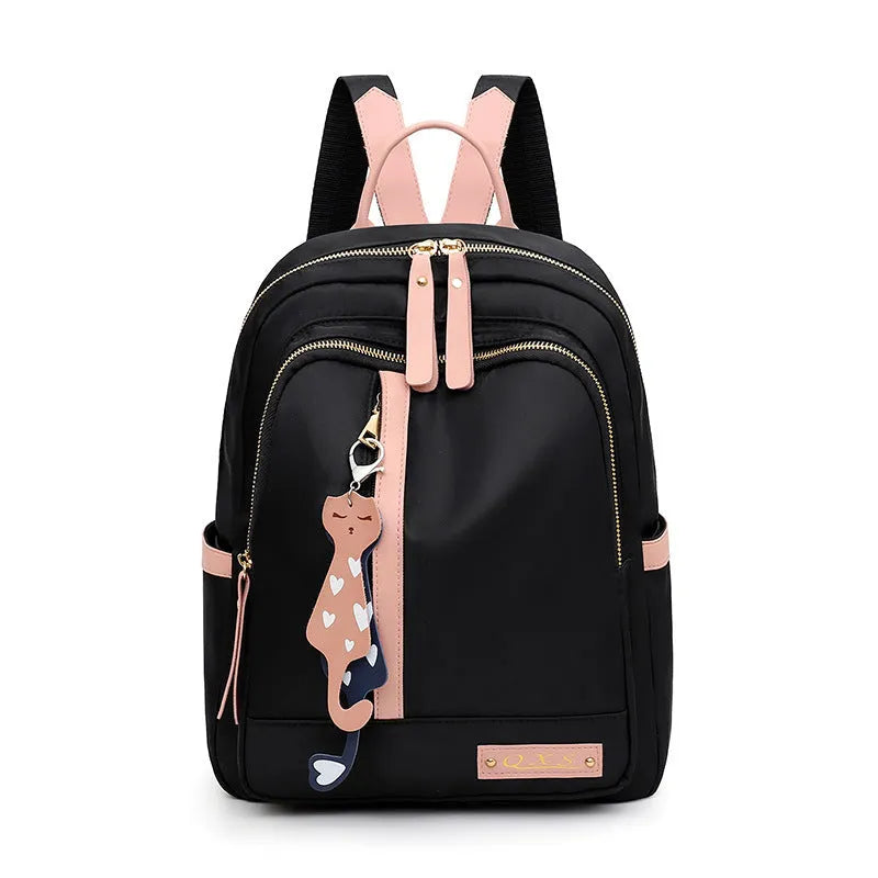 Women's casual backpack in black or pink with 20L capacity, waterproof nylon construction, and internal organiser compartments