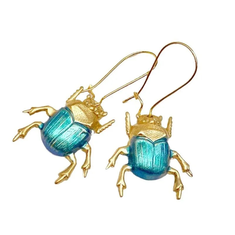 Retro beetle earrings for women, gold metal with electroplated blue finish, creative insect design