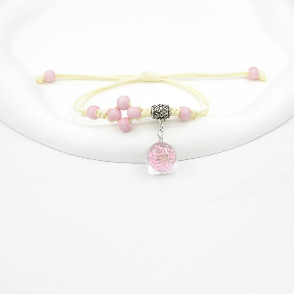 Women's hand-woven glass dried flower bracelet with large 1.4 cm beads in multiple colour options.