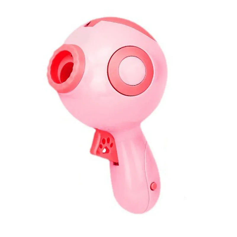 Green, orange or pink dog treat launcher toy measuring 15.5 cm with treat dispensing mechanism