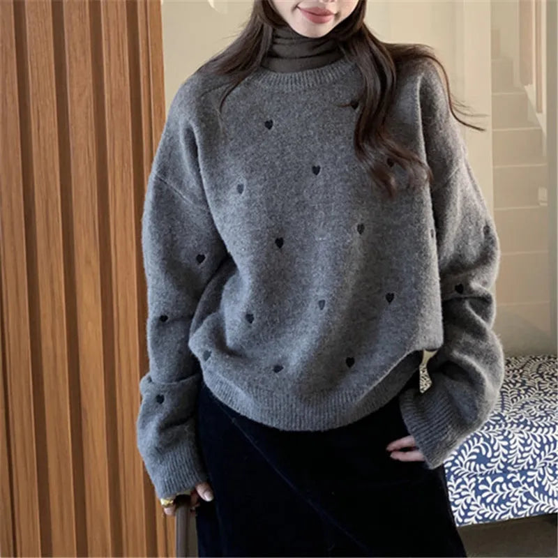 Women's loose fit acrylic pullover sweater with embroidery detail in milky white colour