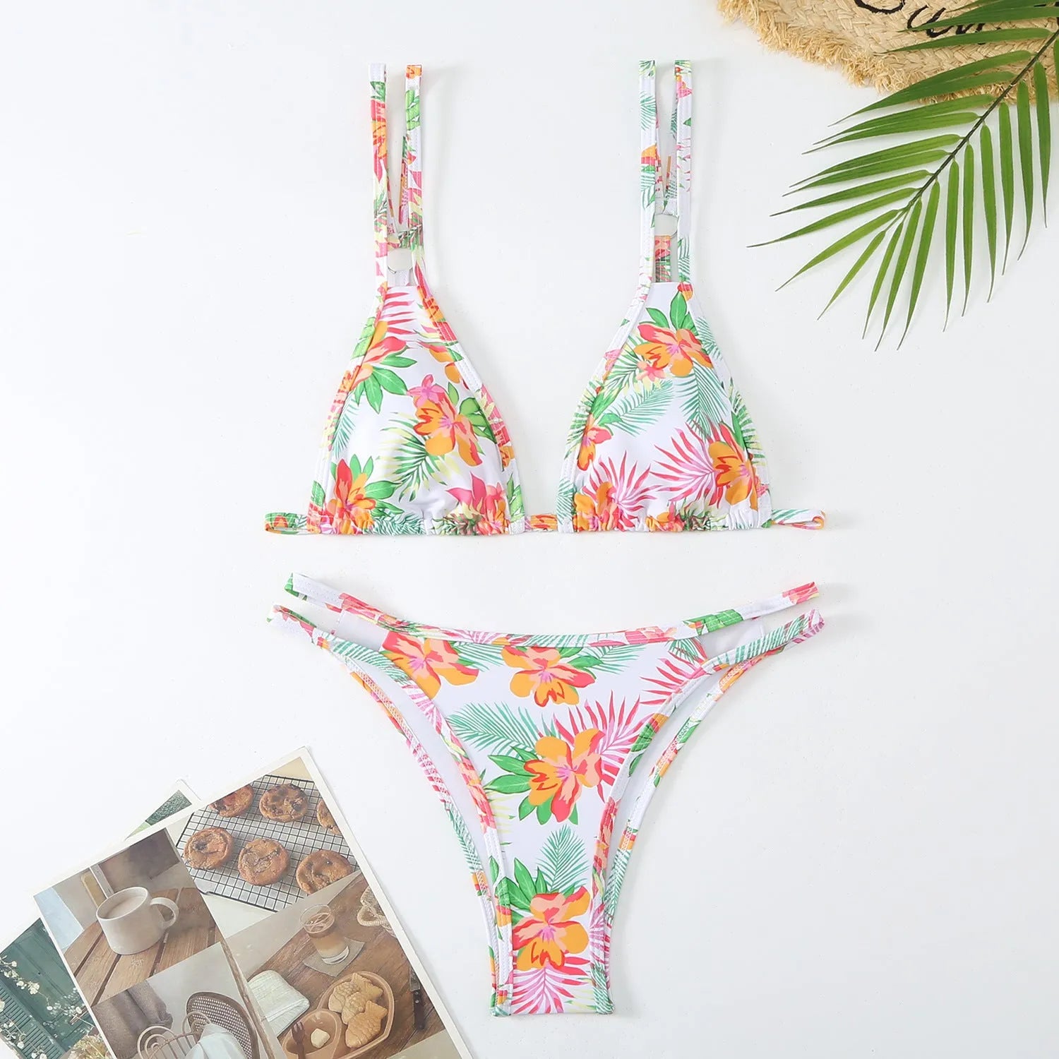 Women's printed halter bikini briefs swimming set in polyester fibre showing floral pattern and backless design