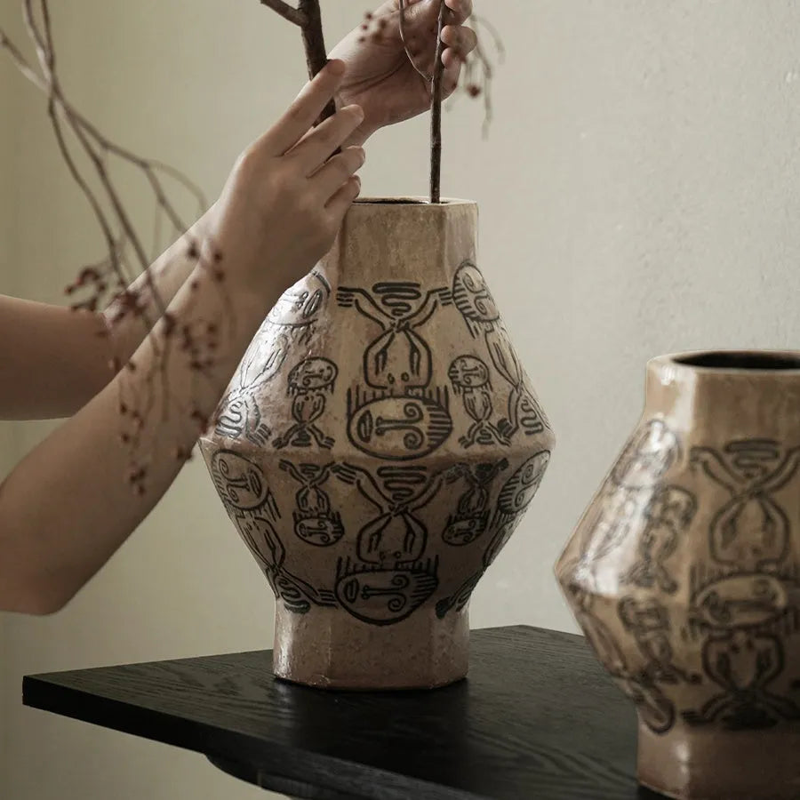 Hand-painted cylindrical ceramic vase with vintage carved tribal totem flower art.