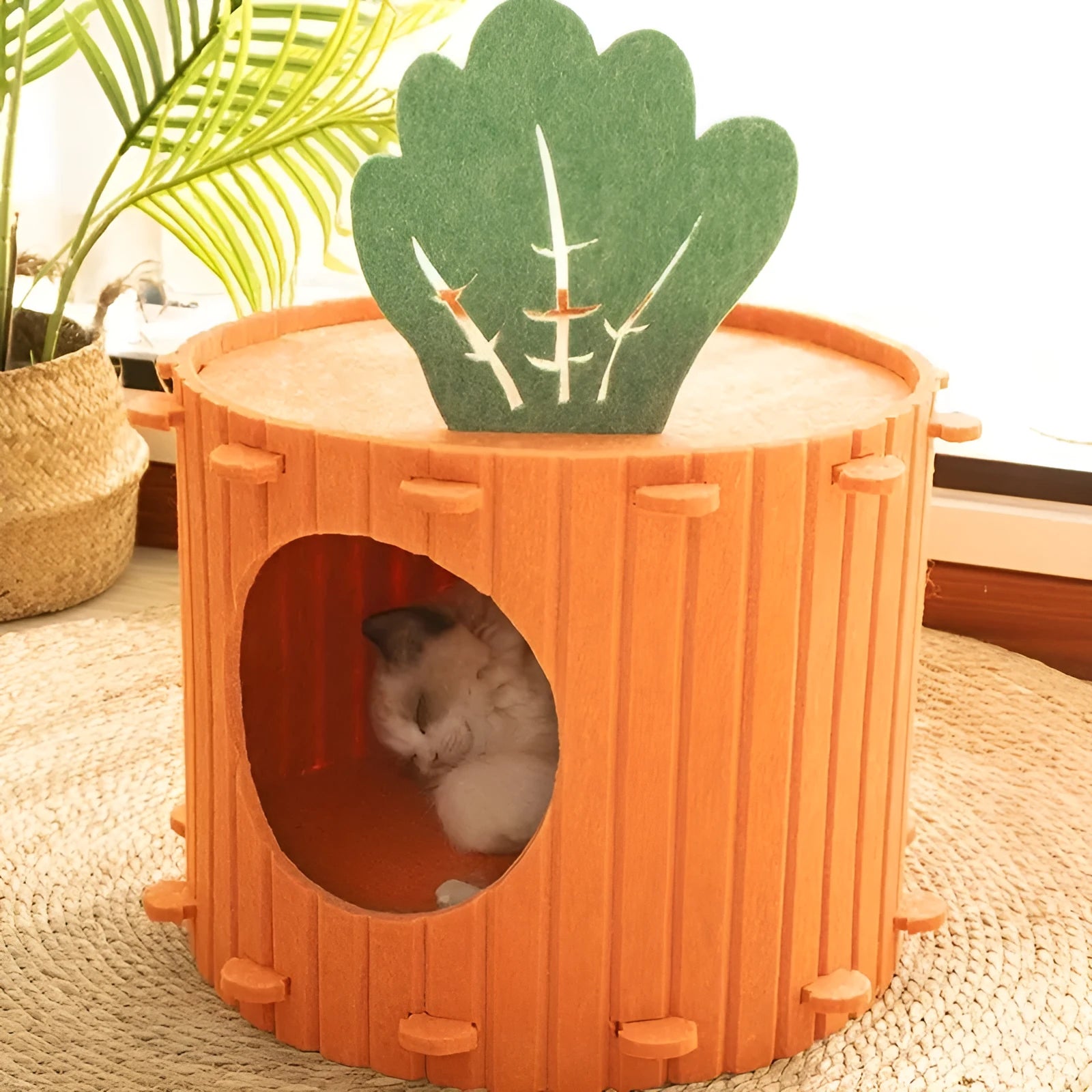 Carrot-shaped felt cat tunnel and semi-enclosed nest for indoor cats, shown in a colour assortment.