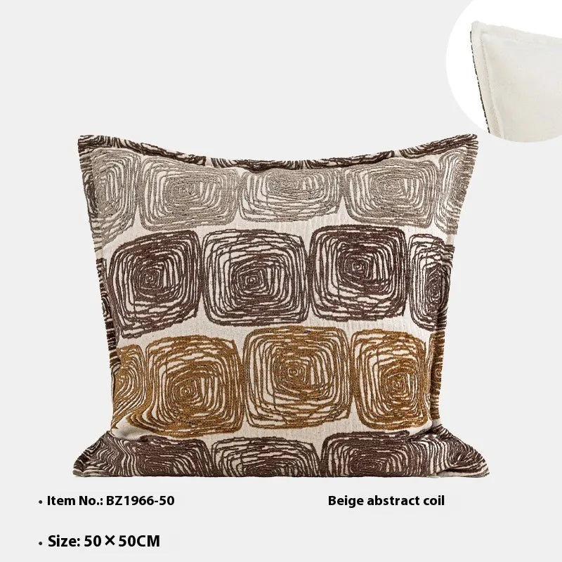Square pillow cover with abstract coil pattern in cream and coffee colours