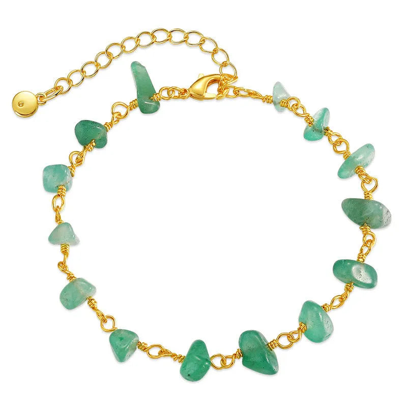 Geometric 18K copper women's bracelet with crystal details and a natural gravel texture, shown in multiple colour options.