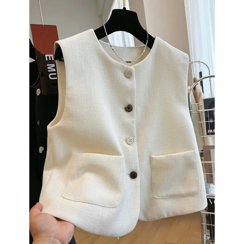 Women's French style bandage vest in milky white polyester with round neck and sleeveless design