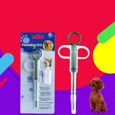 Red and blue pet medicine pills feeder device 15cm long with plastic and silicone construction