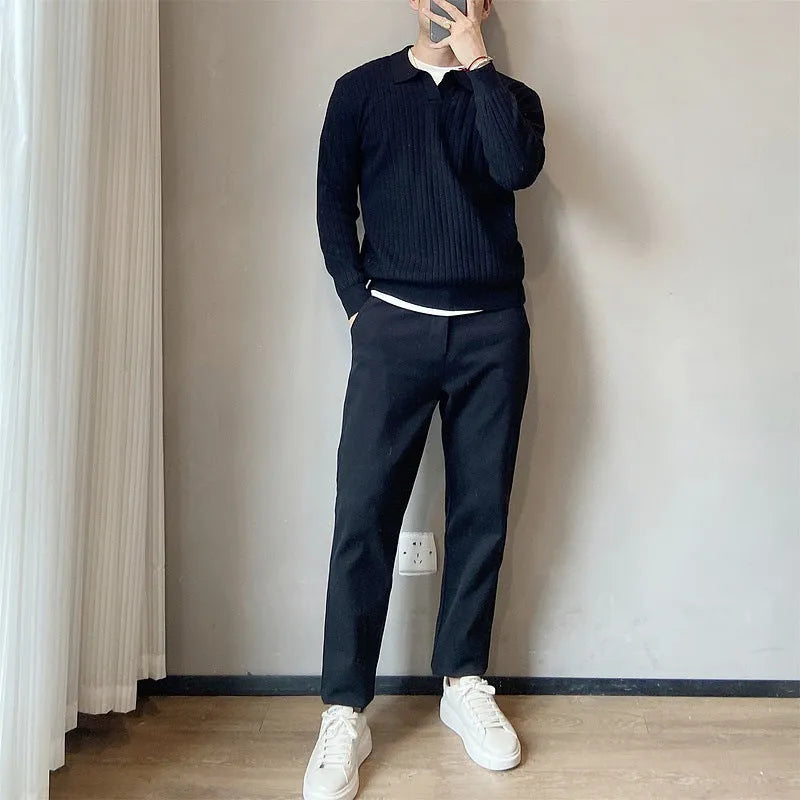 Men's grey striped knitted sweater with a lapel collar, shown in a loose fit.