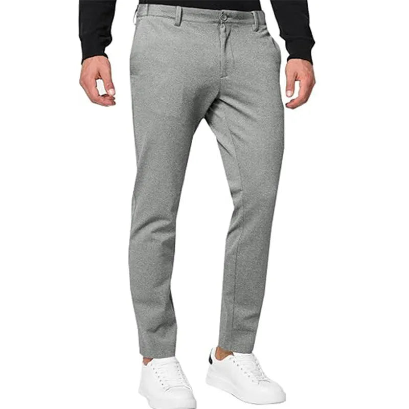 Men's slim-fit tapered chino trousers in a stretch cotton blend fabric, shown in army green colour.